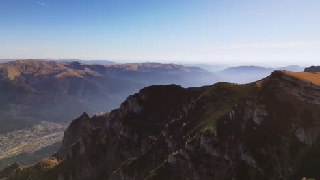 aerial-high-mountains-peak-in-Prahova-County,-Muntenia,-Romania,-scenic-natural-drone-landscape