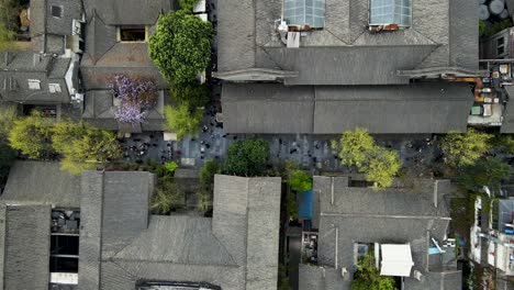 City-Rooftops-and-Alley-Streets-in-Chengdu,-China---Aerial-Bird's-Eye-View