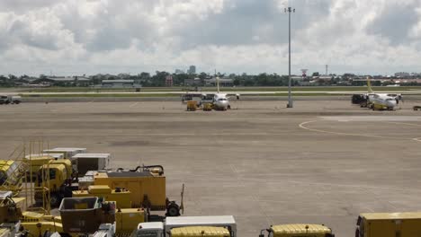 Airport-Bus-Driving-Around-On-The-Airport-Apron-For-Passenger-Transport-In-Cebu,-Philippines