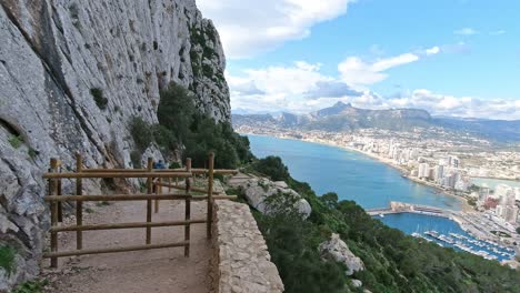 The-walk-down-to-Calpe-from-Penon-De-Ifach-,looking-towards-the-resort-of-Benidorm