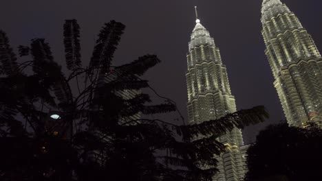 Petronas-Twin-towers-at-night-view-from-Suria-KLCC-Malaysia-spin-shot
