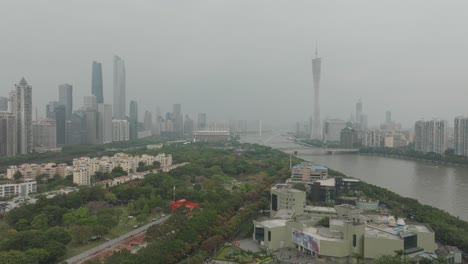 View-on-Guangzhou-Downtown-with-CBD-and-Canton-Tower-in-late-afternoon-from-ErShaDao-island