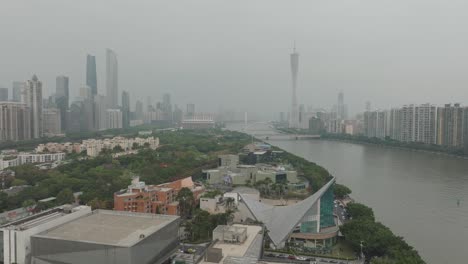 Fly-over-Ershadao-island-with-Guangzhou-city-center-in-the-distance