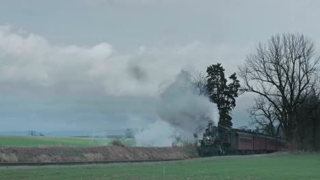 A-Steam-Passenger-Train,-Approaches-Blowing-Smoke