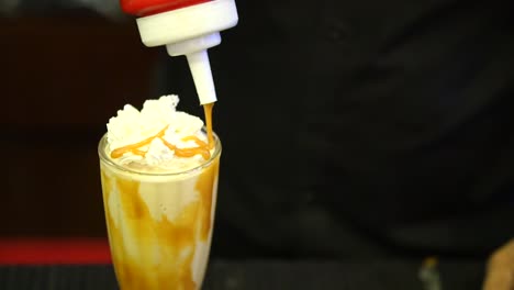 Caramel-Being-Poured-On-Milkshake.-Slow-Motion