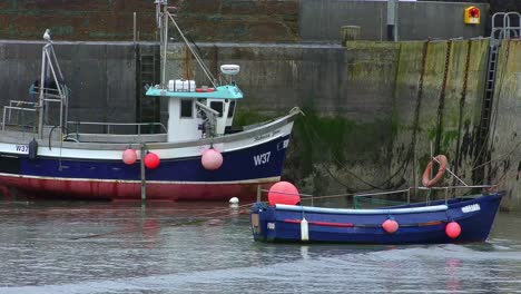 Colourful-fishing-boats-at-Boatstrand-harbour-Copper-Coast-Waterford-Ireland