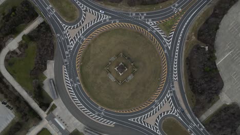 An-aerial-view-over-a-large-roundabout-on-Long-Island,-New-York-on-a-cloudy-day