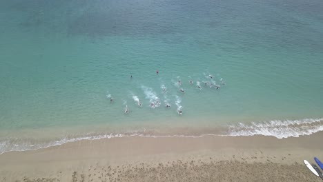 Aerial-view-of-young-swimmers-training-for-ocean-safety-in-Waianae-2