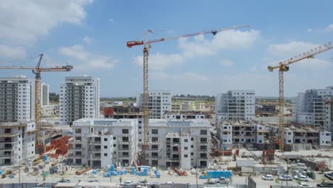 Aerial-Shot-Of-New-Neighbourhood-Cranes-At-Netivot,-Israel