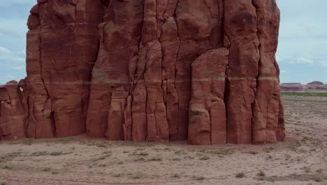 Geological-Layers-of-Sandstone-Rock-in-Standing-Cliff-Rock-Formation-in-Arizona-Desert---Aerial-Pullaway