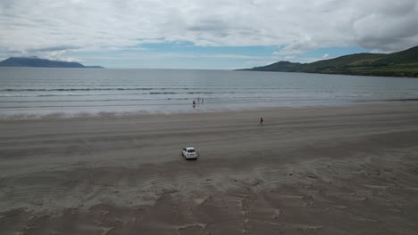 Fiat-500-car-parked-on-inch-beach-Ireland-drone-aerial-view