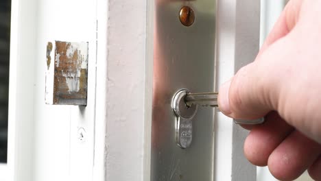 locking-and-unlocking-the-door-with-a-key-also-turning-the-key-in-the-lock