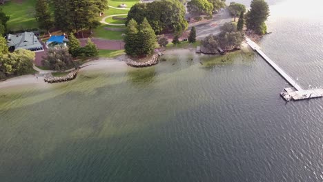 Aerial-View-Over-Point-Walter-Jetty-Panning-Left-To-Reveal-Golf-Course