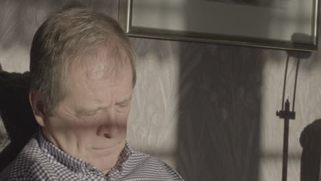 Senior-Man-Daytime-Sleeping-Indoors-the-Sun,-Close-Up