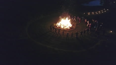 africans dancing around fire