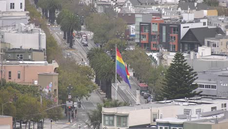 pride-flag-flying-high-over-city