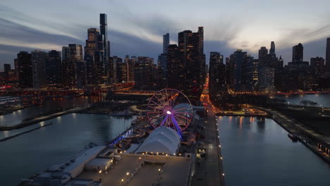 Aerial-view-around-the-Centennial-Wheel-at-the-Navy-Pier,-dusk-in-Chicago,-USA