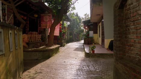 Soft-sunlight-illuminates-the-empty-streets-of-Thanh-Ha,-evoking-a-peaceful-and-serene-atmosphere