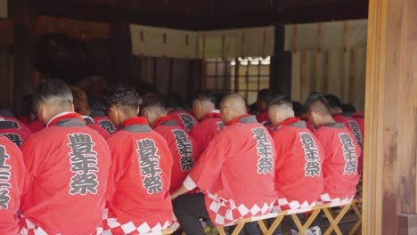 Japanese-Men-in-Festival-Happi-Cloaks-Praying-for-Fertility-Festival-Honensai