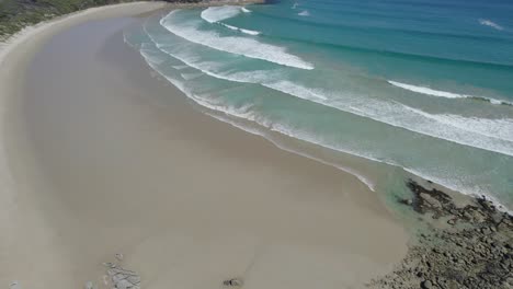 White-Sandy-Shore-And-Turquoise-Water-At-Squeaky-Beach-During-Summer-In-Australia---aerial-drone-shot