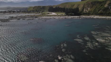 Exploring-the-rocky,-reefy-coastline-of-Kaikoura-New-Zealand