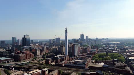 Birmingham-skyline-aerial-footage-with-pull-back-motion-and-landmark-BT-Tower-on-a-Summer`s-afternoon