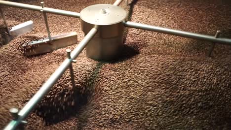 full-HD-1080p-30fps---Chilling-Roasted-coffee-beans-on-spinning-cooling-tray