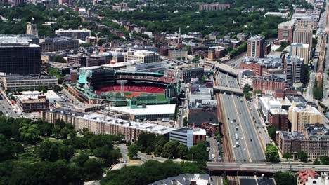 Panning-Boston-Skyline-with-Fenway-Park-baseball-stadium,-Citgo-Sign-and-Boston-University