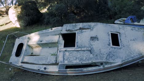 An-abandoned-hull-of-a-small-sailing-boat