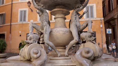 Pan-shot-for-the-Turtle-fountain-in-a-public-square-of-Roma-city-centre