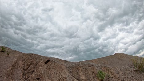 Ominous-rolling-storm-clouds-motion-time-lapse-over-quarry-in-central-Kentucky-1-of-3