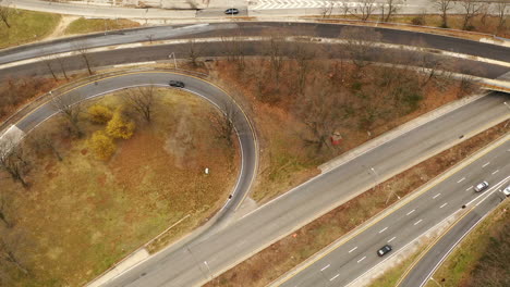 a-high-angle-aerial-shot-over-a-parkway-intersection-with-light-traffic-due-to-the-COVID-19-lock-down-in-New-York