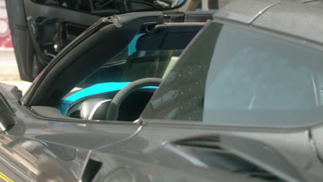 Side-body-panels-of-grey-modern-Chevrolet-Corvette,-Slide-Left