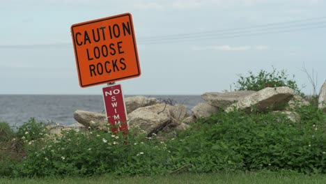 Precaución-Rocas-Sueltas-No-Nadar-Señal-De-Advertencia-Lago-Pontchartrain