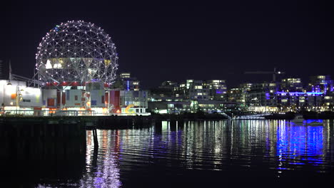Panning-on-False-Creek-at-night-where-building-lights-reflecting-on-water