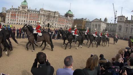 The-Horse-Guards-Parade-looked-on-by-a-crowd-of-tourists-and-visitors