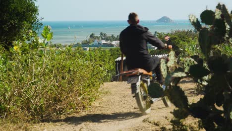 Motorcycle-riding-along-dirt-roads-towards-My-Hoa-Kite-surfing-mecca-near-Phan-Rang-Vietnam