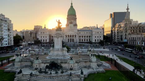 Aerial-of-Monument-of-Two-Congresses-in-square-in-front-of-Argentine-Congress-Palace-at-sunset-in-busy-Buenos-Aires