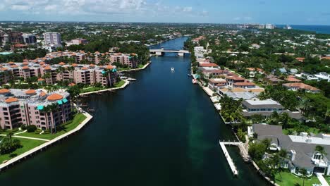 Boca-Raton,-Florida-USA---8-30-2021:-Drone-video-flying-over-the-luxurious-Lake-Boca-Raton-waterway