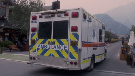 Ambulance-going-trough-pedestrian-zone-in-Banff