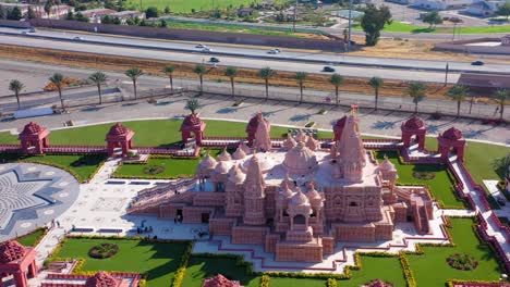 Aerial-fast-panning-left-view-of-a-Hindu-temple-near-Los-Angeles-California