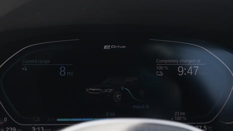 View-Of-Plug-In-Hybrid-Car-Charging-Dashboard-Display
