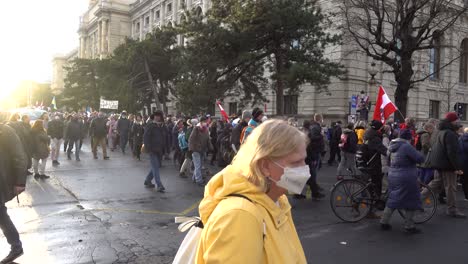 People-wearing-facemasks-during-anti-corona-protests-in-Vienna,-Austria