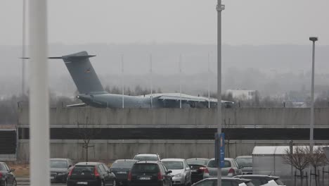 A-Ukrainian-air-force-cargo-airplane-turns-then-taxis-at-Rzeszow-Jasionka-airport,-NATO-base