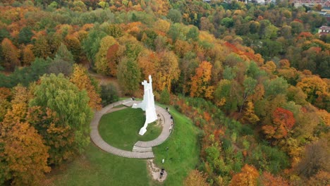 AERIAL:-The-Hill-of-Three-Crosses-in-Vilnius-City-in-Autumn-with-Golden-Trees-Around