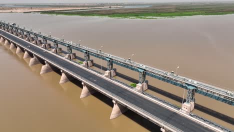 Aerial-drone-shot-of-bride-above-indus-river-in-pakistan