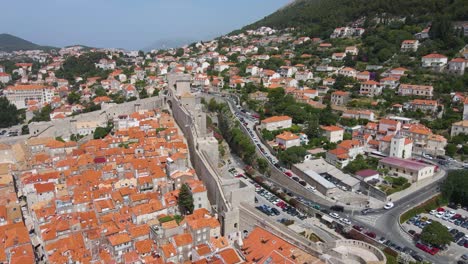 Aerial-view-of-Dubrovnik-in-the-southern-city-of-Croatia-fronting-the-Adriatic-Sea,-Europe-along-the-slope-of-the-hilly-terrain-on-bright-sunny-day