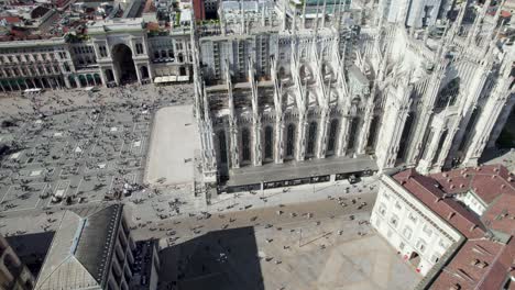Duomo-Cathedral-and-Piazza-Duomo-in-Milan,-Italy,-Aerial-Drone-View,-Tilt-Up