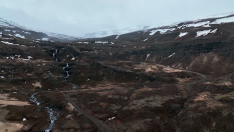 Aerial-View-Of-Klifbrekkufossar-Waterfall-In-East-Iceland---drone-shot