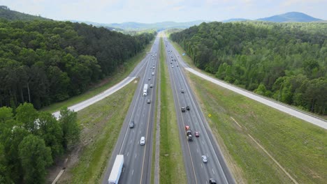 Flying-down-the-interstate-and-traffic-passes-on-both-sides-of-the-divided-highway